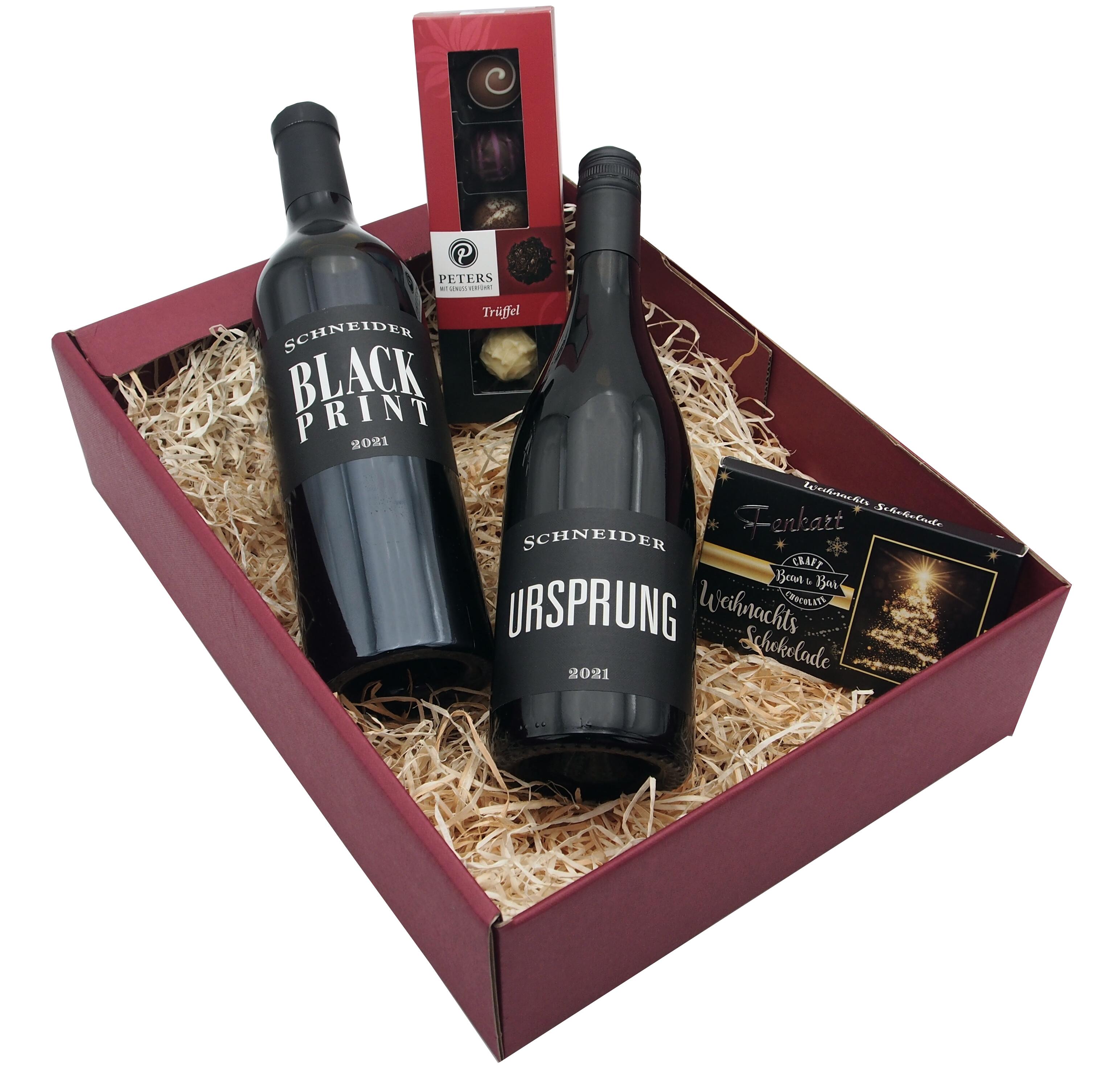 Weinpräsent Markus Schneider mit Trüffelpralinen und Weihnachtsschokolade